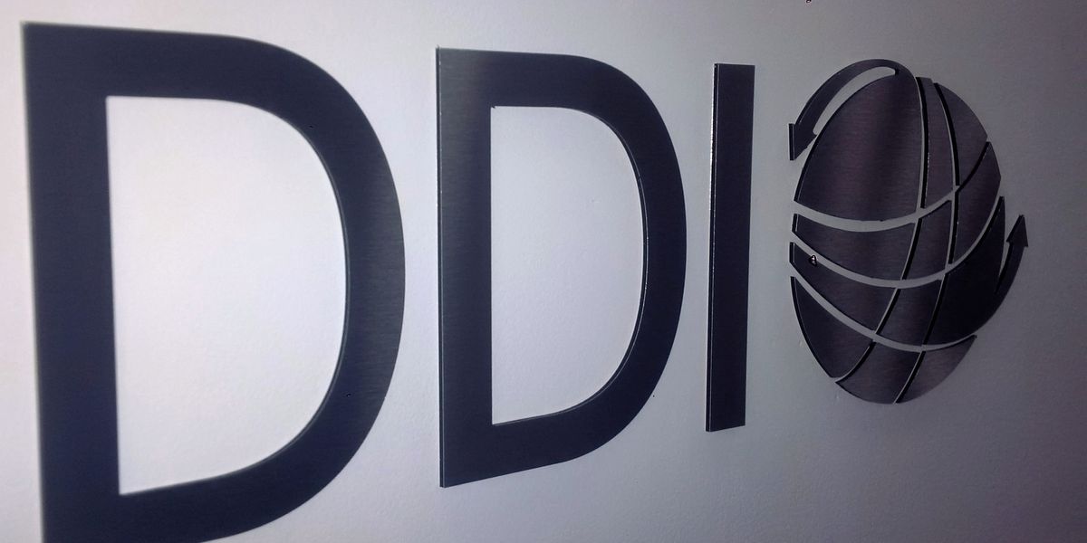 Stainless-steel water-jet cut sign