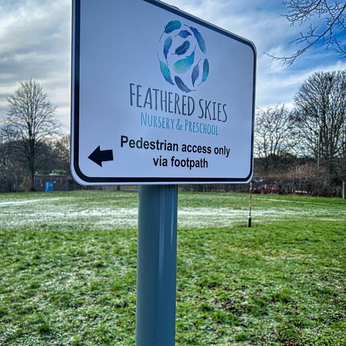 Post-mounted directional sign